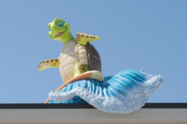 Giant sea turtle rooftop landmark character.