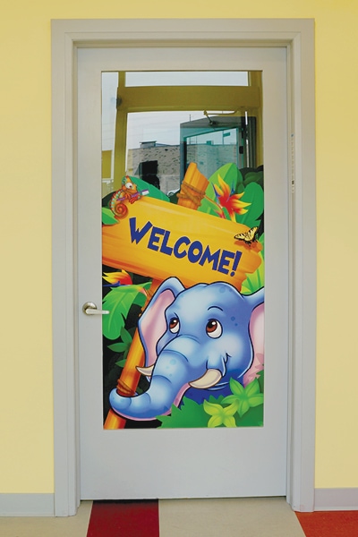 Jungle themed door mural that reads "Welcome!"