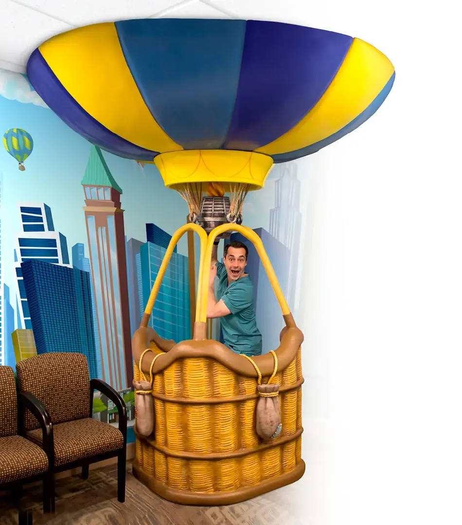 Hot air balloon themed children's waiting area designed for pediatric dental office