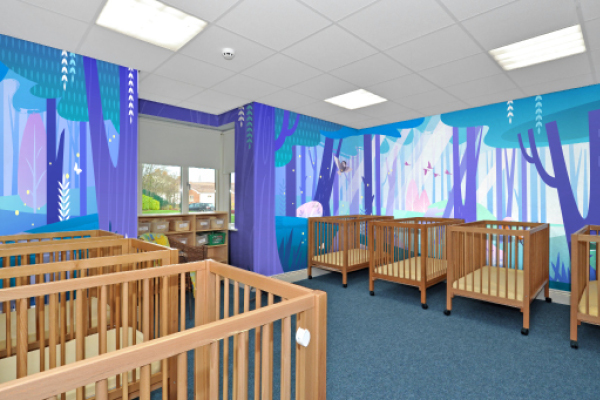 Church nursery nap room with night time woodland mural.