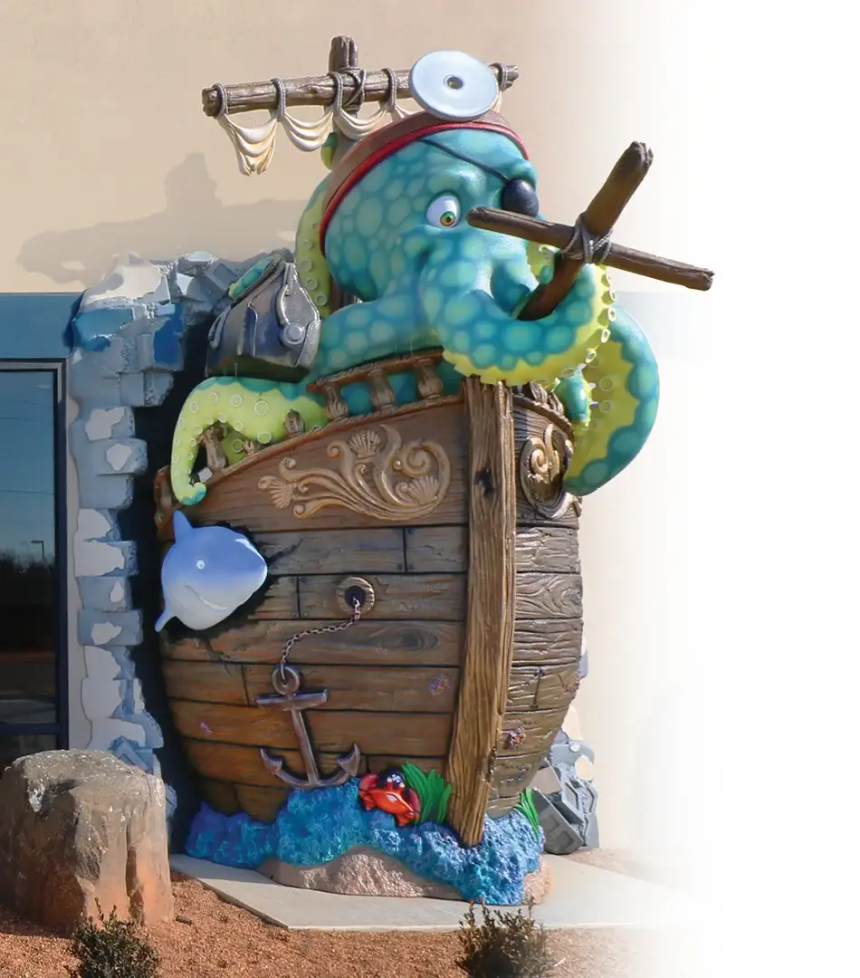 Pirate ship themed children's play and clinic decor designed for pediatric healthcare environment