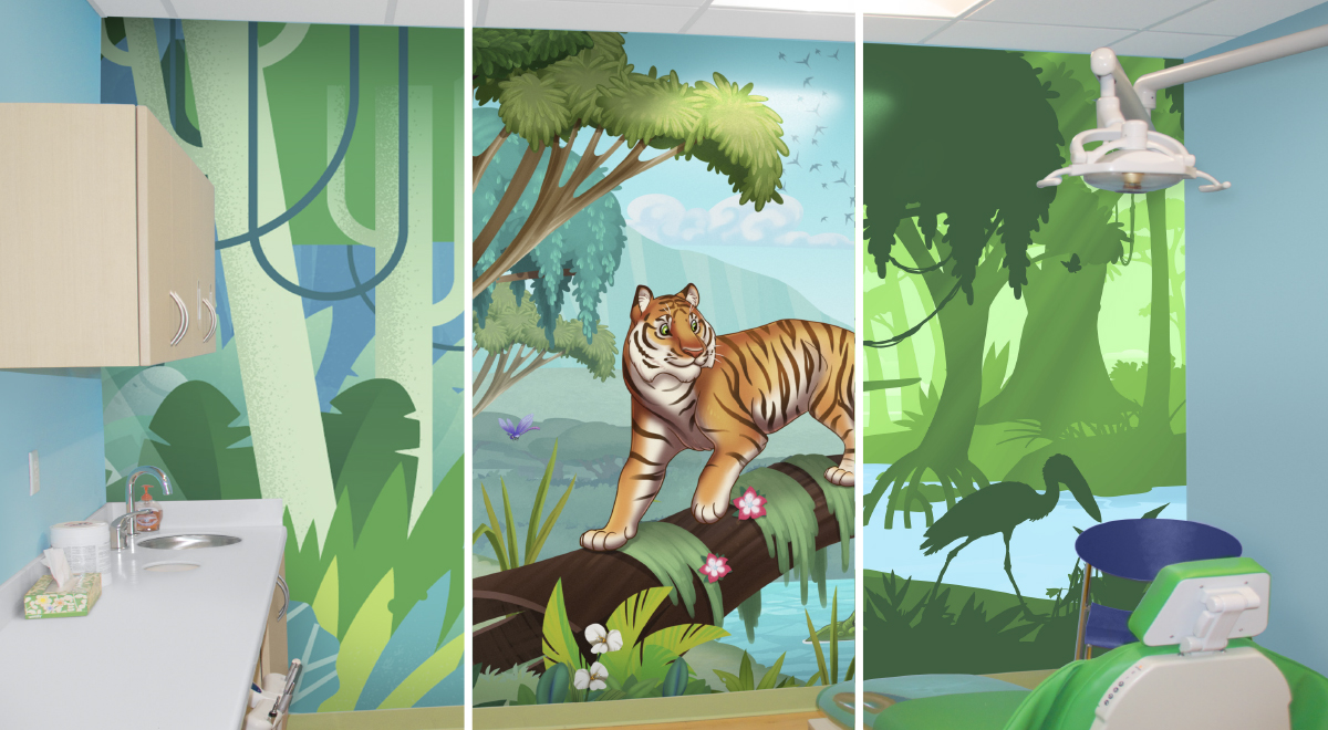 A colorful dental exam room decorated with a jungle mural featuring a tiger standing on a log, surrounded by trees and greenery. There is a dentist chair, cabinets, and a sink in the room.