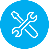 White outline of a wrench and screwdriver crossed over each other, centered on a bright blue circular background.